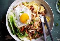 Asian beef mince noodle bowl with fried egg